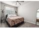 Cozy bedroom with a comfortable bed, soft lighting, and neutral decor at 5187 S Fairplay St, Aurora, CO 80015