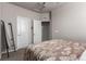 Bedroom featuring neutral colors and an attached closet at 5187 S Fairplay St, Aurora, CO 80015