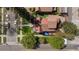 Aerial view of charming home with well-maintained landscaping and a classic red tile roof at 2591 Albion St, Denver, CO 80207