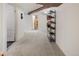 Finished basement provides ample space with carpeted floors and storage, perfect for a recreation or multi-purpose area at 2591 Albion St, Denver, CO 80207