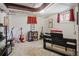 Finished basement featuring musical instruments and carpeted floors, perfect for a music room or entertainment space at 2591 Albion St, Denver, CO 80207