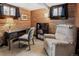 Wood paneled office space with desk and chair at 2591 Albion St, Denver, CO 80207