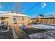 Deck and patio with fire pit and backyard view at 3151 S Corona St, Englewood, CO 80113