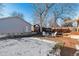 Spacious backyard with deck, fire pit, and shed at 3151 S Corona St, Englewood, CO 80113