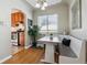 Cozy built-in banquette dining area with hardwood floors at 3151 S Corona St, Englewood, CO 80113