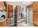 Stainless steel refrigerator in a well-lit kitchen at 3151 S Corona St, Englewood, CO 80113