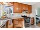 Modern kitchen featuring stainless steel appliances and ample counter space at 3151 S Corona St, Englewood, CO 80113