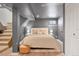 Cozy finished basement bedroom with neutral decor and stairs to the main level at 480 S Grant St, Denver, CO 80209