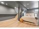 Finished basement bedroom with stairs, finished floors, neutral decor, and a comfortable aesthetic at 480 S Grant St, Denver, CO 80209