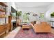 Cozy living room with a decorative fireplace, comfortable seating, and natural light at 480 S Grant St, Denver, CO 80209