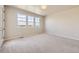 Bedroom with three sunny windows and soft carpet at 2702 E 103Rd Ave, Thornton, CO 80229