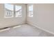 Bedroom with bright natural light, carpet floors, and neutral walls at 2702 E 103Rd Ave, Thornton, CO 80229