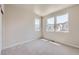 Bedroom featuring three large windows allowing lots of natural light at 2702 E 103Rd Ave, Thornton, CO 80229