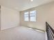 Neutral bedroom with lots of natural light and soft carpet floors at 2702 E 103Rd Ave, Thornton, CO 80229