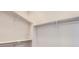 Bright, open walk-in closet with shelving and bars for storage at 2702 E 103Rd Ave, Thornton, CO 80229