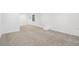 Finished basement area featuring neutral carpet, clean white walls, and recessed lighting at 13701 Yank Way, Arvada, CO 80004
