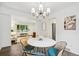 Dining room featuring natural light, hardwood floors, and an open concept at 13701 Yank Way, Arvada, CO 80004