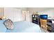 This room offers a full closet, built-in shelving and a built-in desk space at 3595 E 124Th Pl, Thornton, CO 80241