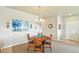 Cozy dining area featuring a round table, chandelier, and tasteful decor at 3595 E 124Th Pl, Thornton, CO 80241