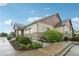 Building exterior featuring manicured flowerbeds, professional landscaping, and ramp access at 3595 E 124Th Pl, Thornton, CO 80241