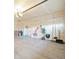 Clean garage with white walls, items, and a door to the interior at 3595 E 124Th Pl, Thornton, CO 80241