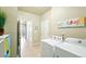 Bright laundry room features a side-by-side washer and dryer and neutral paint at 3595 E 124Th Pl, Thornton, CO 80241