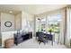 Comfortable home office setup with a large window and ample natural light at 3595 E 124Th Pl, Thornton, CO 80241
