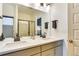 Bathroom featuring double sinks with stylish fixtures, and a spacious shower at 6770 Zebra Grass Ln, Parker, CO 80138