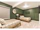 Bedroom with twin beds, decorative wall art, and a window with blinds at 6770 Zebra Grass Ln, Parker, CO 80138