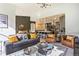 Sun-drenched living space seamlessly connects to the modern kitchen, perfect for entertaining at 6770 Zebra Grass Ln, Parker, CO 80138