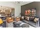 Spacious living area showcasing stylish decor and a seamless transition to the modern kitchen at 6770 Zebra Grass Ln, Parker, CO 80138