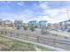 Well-maintained neighborhood with attractive homes, xeriscaping, and a rustic wooden fence at 6770 Zebra Grass Ln, Parker, CO 80138