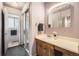 Well-lit bathroom featuring a vanity with storage, neutral walls, and updated fixtures for a relaxing and clean aesthetic at 2648 S Wadsworth Way, Lakewood, CO 80227