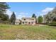 Exterior view of the house with a large backyard at 16835 E Harvard Pl, Aurora, CO 80013