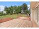 Outdoor deck with green backyard and shed at 16835 E Harvard Pl, Aurora, CO 80013