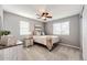 Comfortable bedroom with neutral colors, ceiling fan, and lots of natural light at 4968 Montvale Dr, Highlands Ranch, CO 80130