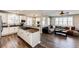 Modern kitchen with granite countertops and a seamless view into the adjacent living space at 4968 Montvale Dr, Highlands Ranch, CO 80130