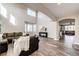 Spacious living room with soaring ceilings, large windows, and an open layout at 4968 Montvale Dr, Highlands Ranch, CO 80130