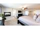 Comfortable main bedroom showing the ensuite bathroom and access to the hallway at 4968 Montvale Dr, Highlands Ranch, CO 80130