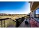 Patio with an outdoor sofa and table offering views of the neighborhood landscape at 4968 Montvale Dr, Highlands Ranch, CO 80130