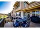 Spacious patio with an outdoor seating area, a grill, and views of the neighborhood at 4968 Montvale Dr, Highlands Ranch, CO 80130