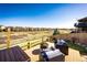 Outdoor patio with a fire pit, seating, and views of the neighborhood at 4968 Montvale Dr, Highlands Ranch, CO 80130