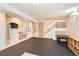 The finished basement offers flexible space, including tile floors and a staircase at 15912 E Dakota Pl # C, Aurora, CO 80017