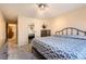 Comfortable bedroom with soft carpet, natural light and view into the hallway at 15912 E Dakota Pl # C, Aurora, CO 80017