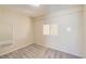 This bright bedroom has neutral walls, gray carpet, and a double window for ample natural light at 15912 E Dakota Pl # C, Aurora, CO 80017
