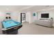 Spacious basement with pool table and seating area, ideal for entertainment at 3193 W 134Th Cir, Broomfield, CO 80020