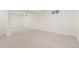 Spacious finished basement with neutral carpet and drop ceiling at 3193 W 134Th Cir, Broomfield, CO 80020