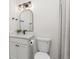 Bathroom with matte black fixtures, and an arched mirror at 3193 W 134Th Cir, Broomfield, CO 80020