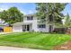 Charming two-story home with a well-manicured front yard and attached garage at 3193 W 134Th Cir, Broomfield, CO 80020