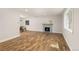 Bright living room with a fireplace and hardwood floors at 3193 W 134Th Cir, Broomfield, CO 80020